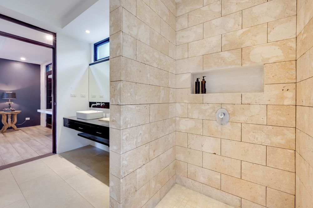 Travertine walk-in shower